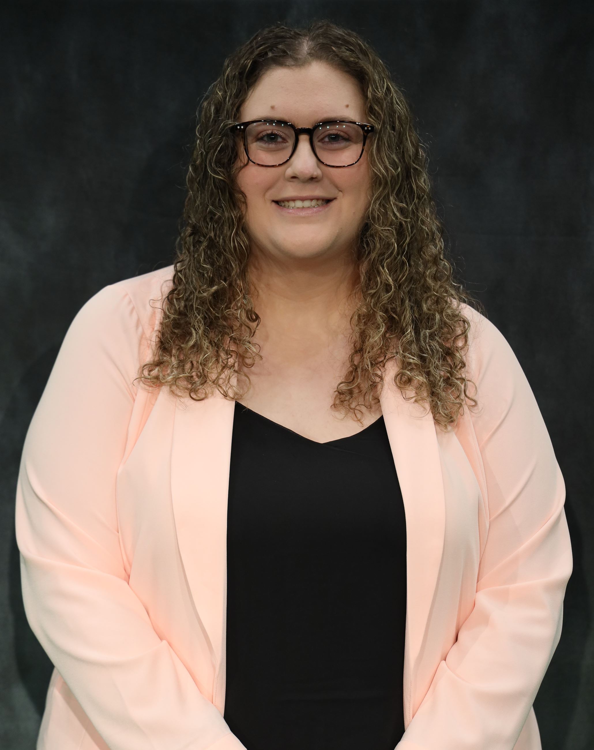 Professional photo of Deputy Clerk Sarah El-Rifaai.